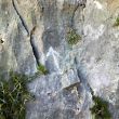 Marca de inicio del Espoln Finestrat - Flecha que marca el comienzo de la va.