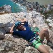 Adri tomando el sol - En la cima tras escalar la va Polvos mgicos